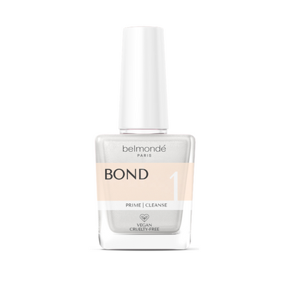 Belmondé Paris – Bond 1 – Flaska med Belmondé Paris Bond 1, en primer och rengöringsvätska som förbereder nagelplattan för maximal vidhäftning. Berikad med kalcium, vitamin B och växtbaserat keratin för friska naglar och salongskvalitativa resultat. Vegan och cruelty-free.