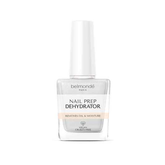 Belmondé Paris – Nail Prep Dehydrator – Flaska med Belmondé Paris Nail Prep Dehydrator, en nagelförberedande vätska som effektivt avlägsnar olja och fukt från nagelytan för bästa vidhäftning av gelé, akryl eller andra nagelprodukter. Vegan och cruelty-free.